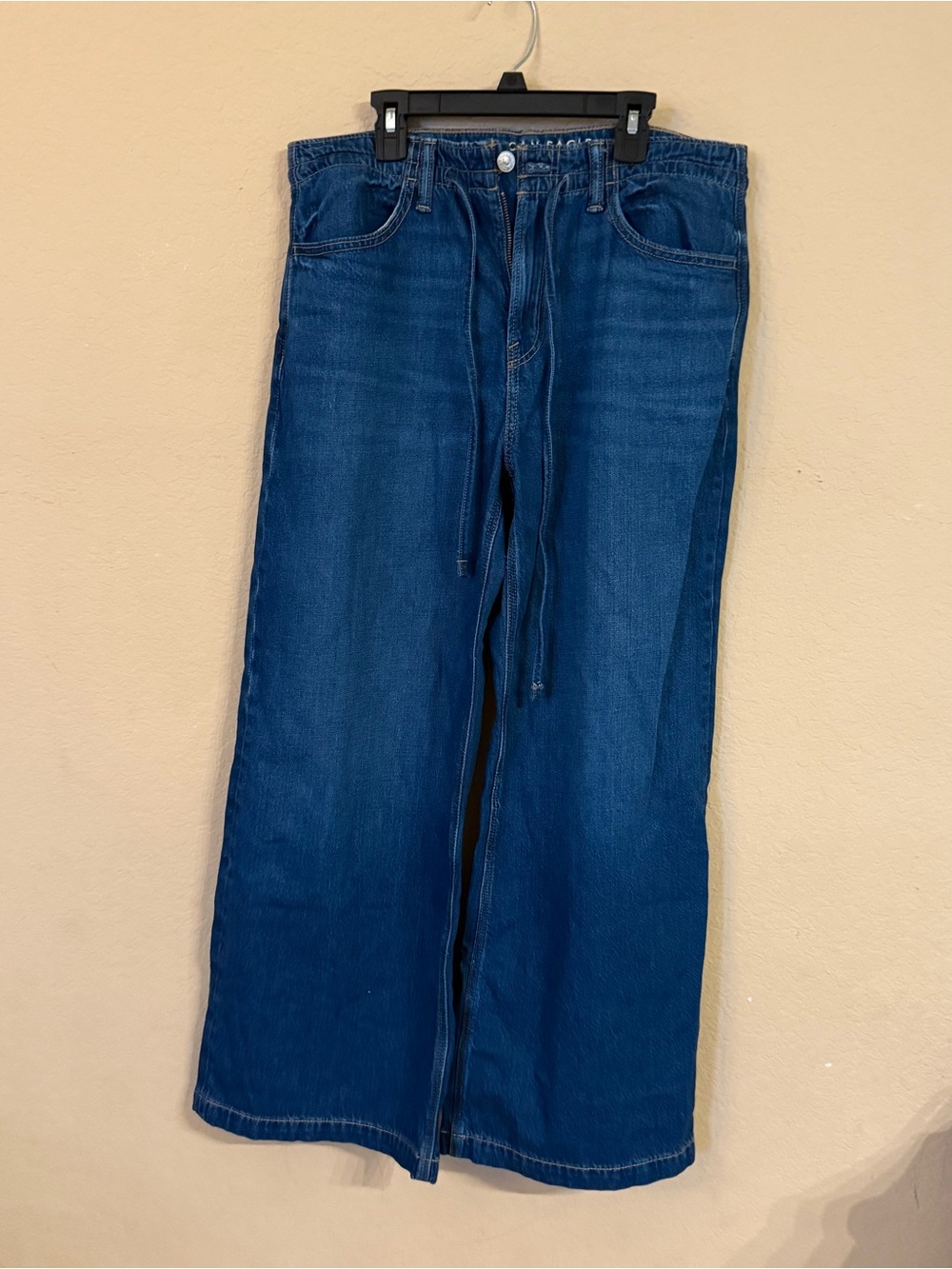 American Eagle Sydney Sweeney Dreamy Drape Super Low Rise Wide Leg Jeans - Picture 3 of 8